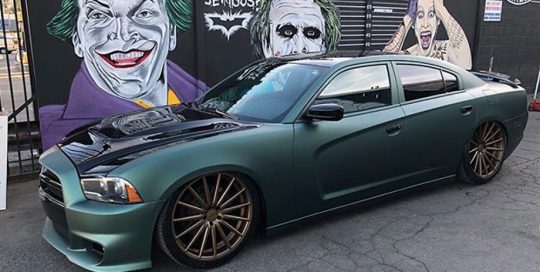 Dodge Charger wrapped in Matte Pine Green Metallic vinyl