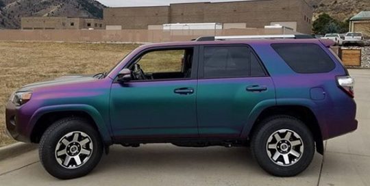 Toyota 4Runner wrapped in Avery ColorFlow Satin Lightning Ridge Green/Purple shade shifting vinyl