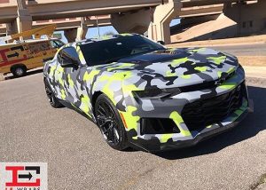 Chevrolet Camaro wrapped in custom printed camo on Avery 1105EZRS vinyl with 1380z Matte overlaminate