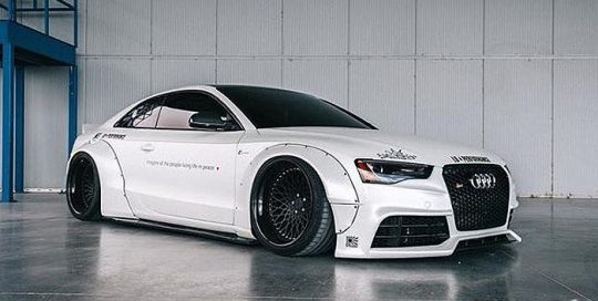 Audi S5 wrapped in Avery SW Satin Pearl White vinyl