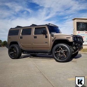 Hummer H2 wrapped in Matte Brown Metallic vinyl