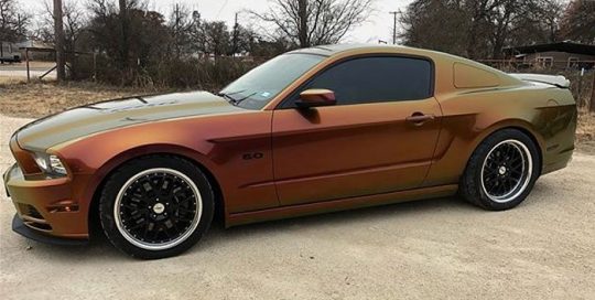 Ford Mustang-GT wrapped in Avery ColorFlow Rising Sun Red/Gold shade shifting vinyl