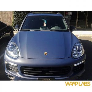 Porsche Cayenne wrapped in Matte Indigo Blue vinyl