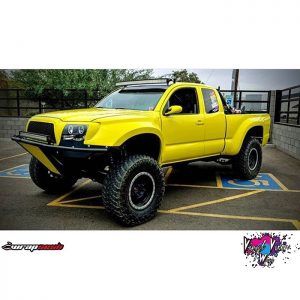 Toyota Tacoma wrapped in Orafol 970RA Gloss Canary Yellow vinyl