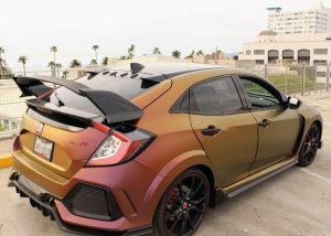 Honda Civictyper wrapped in Avery ColorFlow Satin Rising Sun Red/Gold shade shifting vinyl