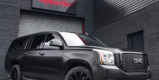 GMC Denali wrapped in Avery SW Satin Black vinyl