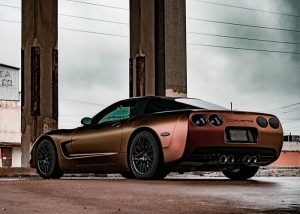 Chevrolet Corvette wrapped in Avery ColorFlow Satin Rising Sun Red/Gold shade shifting vinyl