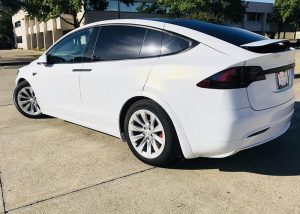 Tesla Modelx wrapped in Gloss White Gold Sparkle vinyl