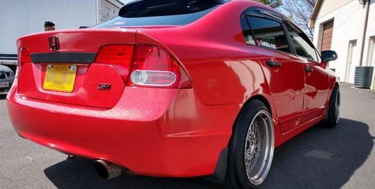 Honda Civic wrapped in Avery SW Diamond Red vinyl