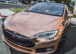 Tesla Car wrapped in Avery SW Rose Gold Chrome vinyl
