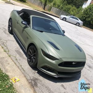 Ford Mustang wrapped in Matte Military Green vinyl