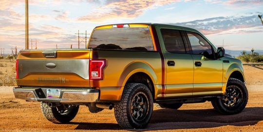 Ford F150 wrapped in Avery ColorFlow Gloss Rising Sun Red/Gold shade shifting vinyl