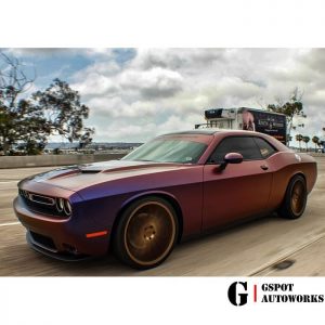 Dodge Challenger wrapped in Avery ColorFlow Satin Roaring Thunder Blue/Red shade shifting vinyl