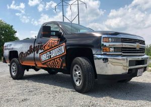 Chevrolet Silverado wrapped in Avery 1105 vinyl with 1360z Gloss overlaminate
