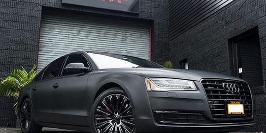 Audi A8 wrapped in Matte Deep Black vinyl