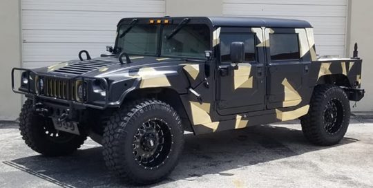 Hummer H1 wrapped in Matte Black, Avery SW Gloss Gold Metallic, and Oracal Gold Mirror vinyls