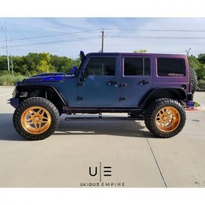 Jeep Wrangler wrapped in Avery ColorFlow Satin Rushing Riptide Cyan/Purple shade shifting vinyl