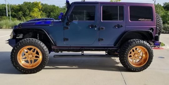 Jeep Wrangler wrapped in Avery ColorFlow Satin Rushing Riptide Cyan/Purple shade shifting vinyl