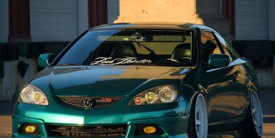 Acura TSK wrapped in Avery SW Gloss Dark Green Pearl vinyl