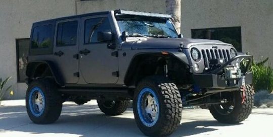Jeep Wrangler wrapped in Matte Dark Gray vinyl