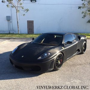 Ferrari F430 wrapped in Black Straight Carbon Fiber vinyl