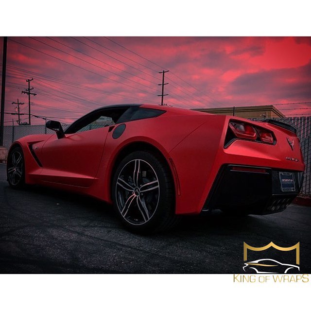 Chevrolet Corvette wrapped in Avery SW Satin Carmine Red vinyl
