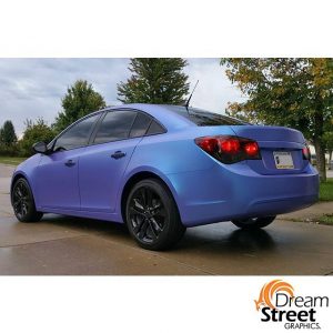 Chevrolet Cruze wrapped in Satin ColorFlip Glacial Frost Blue/Purple shade shifting vinyl