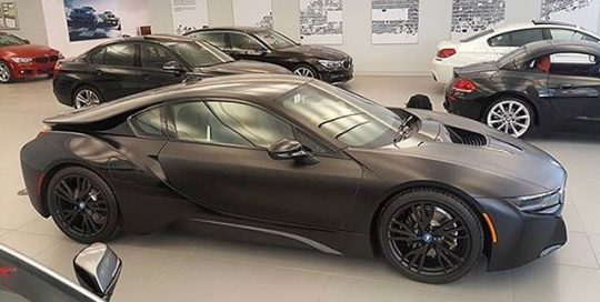 BMW I-8 wrapped in Satin Black vinyl