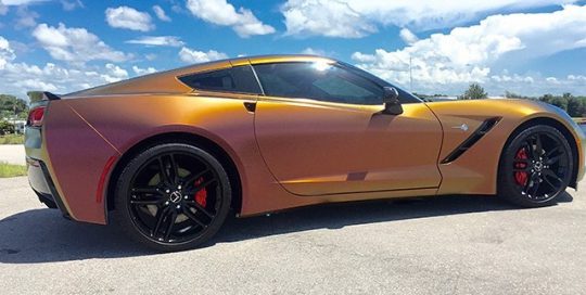Chevrolet Corvette wrapped in Avery ColorFlow Satin Rising Sun Red/Gold vinyl