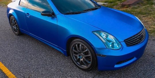 Infiniti G35 wrapped in Satin Glacial Frost Blue/Purple shade shifting vinyl