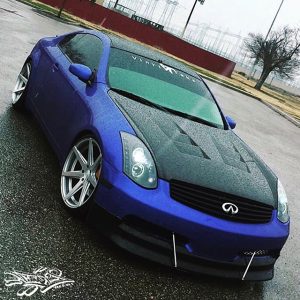 Nissan G35 wrapped in Gloss Cosmic Blue vinyl