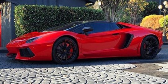 Lamborghini Aventador wrapped in Avery SW Gloss Carmine Red vinyl