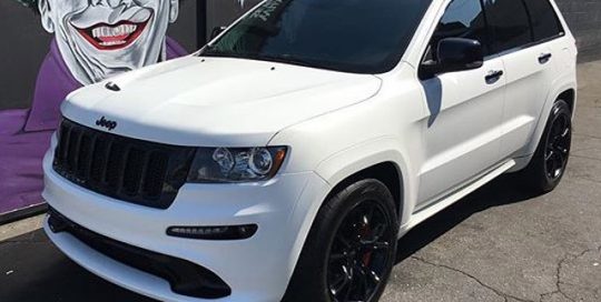 Jeep Cherokee wrapped in Satin Pearl White vinyl