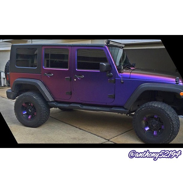 Jeep Wrangler wrapped in Avery ColorFlow Satin Roaring Thunder Blue/Red