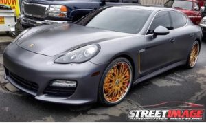 Porsche Panamera wrapped in Satin Dark Gray vinyl