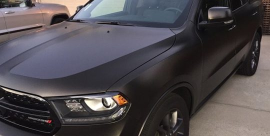 Dodge Durango wrapped in Satin Gold Dust and Satin Dark Gray vinyls