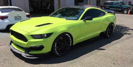 Ford Mustang wrapped in Avery SW Gloss Lime Green vinyl