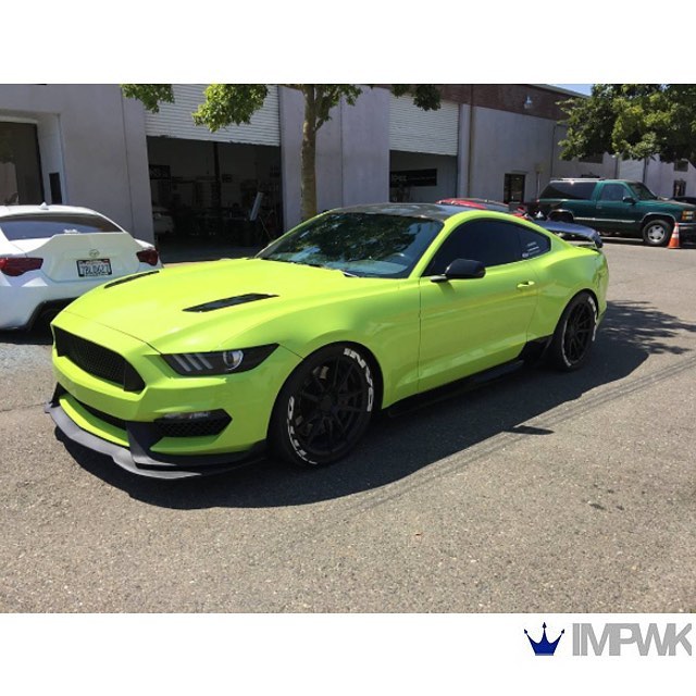 Ford Mustang wrapped in Avery SW Gloss Lime Green vinyl