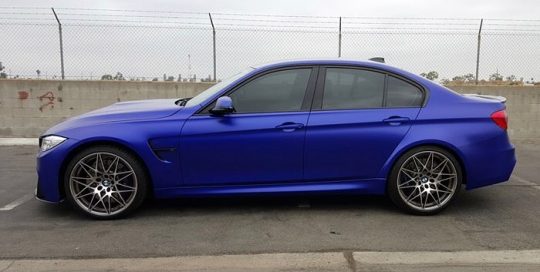 BMW M-3 wrapped in Satin Mystique Blue vinyl