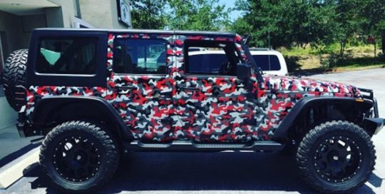 Jeep Wrangler wrapped in custom printed camo on Avery 1005EZRS vinyl