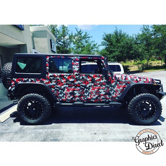 Jeep Wrangler wrapped in custom printed camo on Avery 1005EZRS vinyl