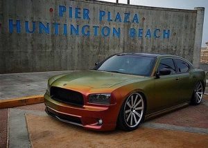 Dodge Charger wrapped in Avery ColorFlow Satin Rising Sun Red/Gold shade shifting vinyl