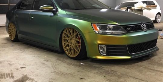 Volkswagen Jettagti wrapped in Avery SW ColorFlow Satin Fresh Spring Gold/Silver shade shifting vinyl