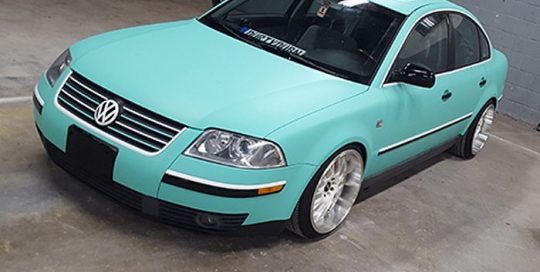 VW Passat wrapped in Avery SW Matte Vintage Green vinyl