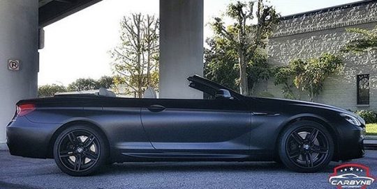 BMW 650-I wrapped in Avery SW Satin Black vinyl