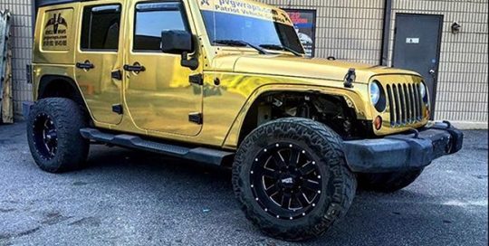 Jeep Rubicon wrapped in Avery SW Gold Chrome vinyl