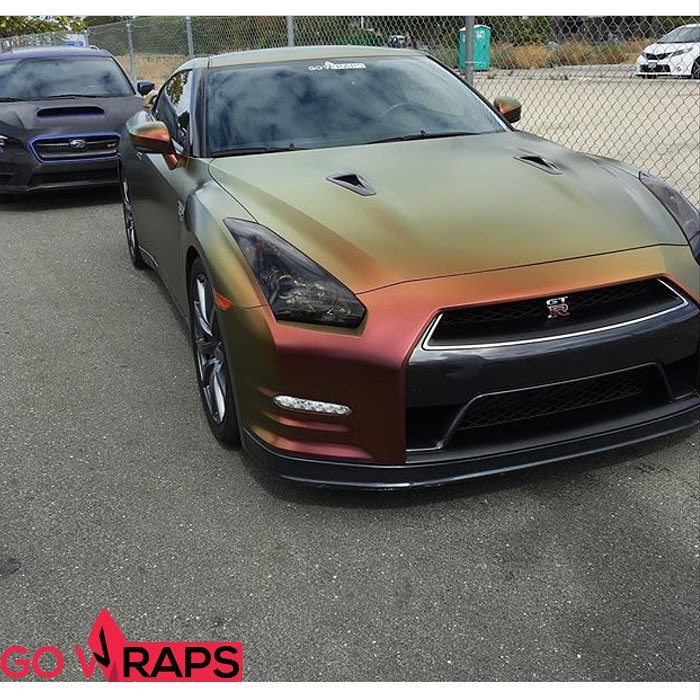 Nissan GTR wrapped in Avery ColorFlow Rising Sun Red/Gold shade shifting vinyl
