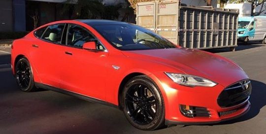 Tesla Models wrapped in Satin Smoldering Red vinyl