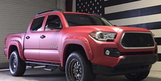 Toyota Tacoma XSP wrapped in Avery Garnet Metallic vinyl