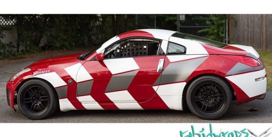 Nissan 350Z wrapped in Gloss White and Avery SW Gunmetal Metallic vinyls over red base paint